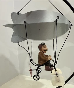 Airship Christmas Ornament Man Peddling A Bike With Zeppelin Blimp Early Flight - Picture 1 of 11