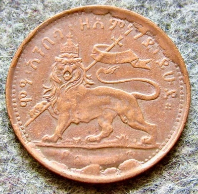 ETIOPÍA MENELIK II 1897 1/32 BIRR, LEÓN CORONADO COBRE o LATÓN Mejor Grado Foto 1 de 4