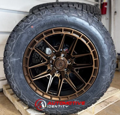 20x10 Arena Battle Bronze Wheels 33" Fuel AT Tires 8x180 Chevy Silverado 2500 HD - Image 1 of 4