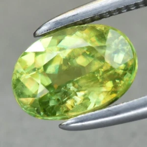 1.07ct 7x5mm Oval Natural Yellowish Green Sphene Gemstone, Super Sparkles - Imagen 1 de 4