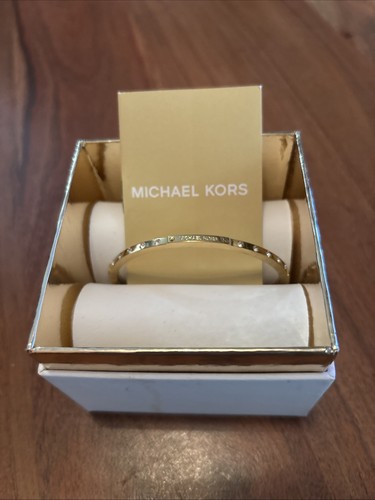 Bracciale Michael Kors borchiato oro Mkj384710