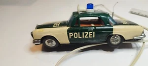 Oldtimer Mercedes Benz Polizei, Blechspielzeug, batteriebetrieben, 60er Jahre Japan - Bild 1 von 7