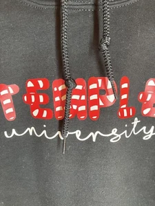 Neu mit Etikett Temple University Herren Gildan Hoodie schwarz Weihnachten Süßigkeiten Stock Medium - Bild 1 von 5