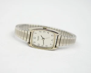 Reloj retro afilado tono plata para dama correa elástica de acero inoxidable batería nueva  - Imagen 1 de 12