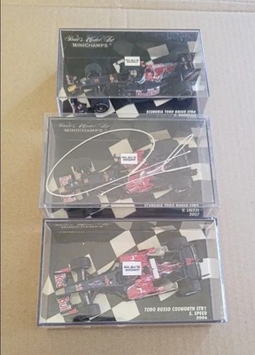 Minichamps 1/43 Scuderia Toro Rosso Set di 3 auto con autografi modellini di ... - Immagine 1 di 4