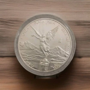 2012 Libertad 1 Oz .999 Silver in Cap Never Opened UNC BU - Picture 1 of 2