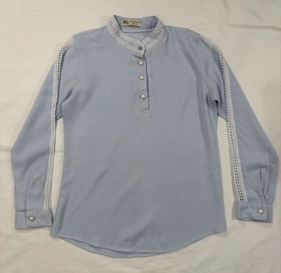 Blusa azul manga larga Burberry para mujer talla XS Foto 1 de 4