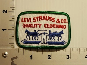 LEVI STRAUSS & CO QUALITY CLOTHING VINTAGE EMBROIDERED PATCH (green/blue) - Picture 1 of 2