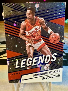 2024-25 Dominique Wilkins Panini Revolution Legends Blue Cosmo /295 #162 Hawks - Bild 1 von 2