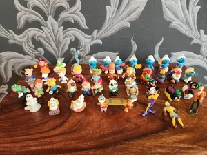 Kinder Ei Spielzeug Schlümpfe Pinguine Geister Tom Gerry Peanut Road Runner Yogi Bär  - Bild 1 von 11