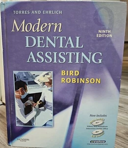 Modern Dental Assisting Torres & Ehrlich Lehrbuch mit DVD von Bird & Robinson - Bild 1 von 1