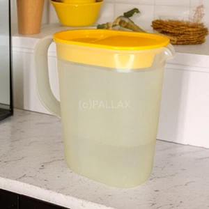 TUPPERWARE VINTAGE SAFTKANNE 1,2 L SONNEN-GELB - Picture 1 of 2