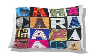Personalisierter Kissenbezug CARA mit dem Namen auf Fotos von Zeichenbuchstaben - Bild 1 von 1