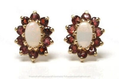 Aretes con halo de ópalo y granate de corte ovalado de 2 quilates acabado en oro amarillo de 14 quilates Foto 1 de 3