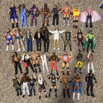Mattel WWE Elite 33 Figure Lot Mint Rock Undertaker LA Knight New Day Finn Balor - Image 1 of 4