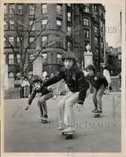 1976 Press Photo Gary and John Doyle, Michael Shea skateboard in Boston Common