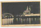 Ak Köln, Brücke u. Dom mit Beleuchtung, Kupfertiefdruck, ungelaufen ca. 1920