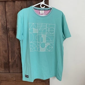 NEU 2024 Paris Olympische Sommerspiele offizielles Merchandise T-Shirt Größe Large türkis - Bild 1 von 14