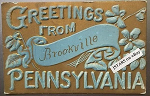 1900s BROOKVILLE, PA, EMBOSSED AIRBRUSHED FLOWERS GREETINGS FROM POSTCARD - Picture 1 of 2