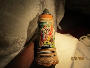 Piedra de cerveza de cerámica Lindeuwitin alemana vintage con tapa y caja de música - Imagen 1 de 7
