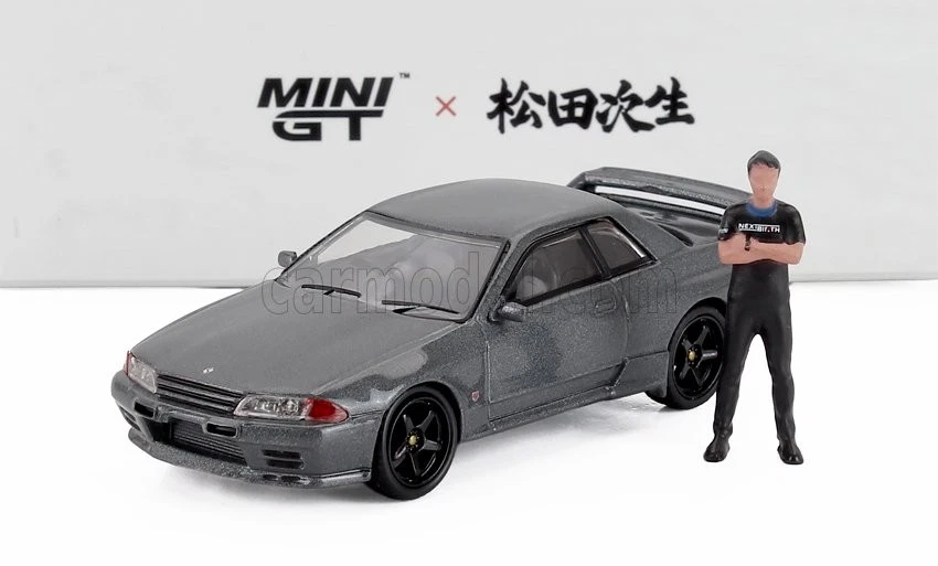 1/64 MINI-GT - NISSAN - SKYLINE GT-R (R32) NISMO RHD 1992 WITH TSUGIO MGT00869-R - Immagine 1 di 1