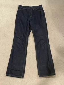 Jeans de mezclilla lavado oscuro UNIQLO 26x32 - Imagen 1 de 6