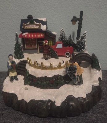 Árboles musicales vintage de Navidad Avon a la venta figura de Navidad mueve luces  Foto 1 de 4