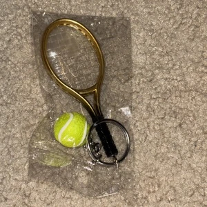 Llavero dorado para raqueta de tenis y pelota - Imagen 1 de 9
