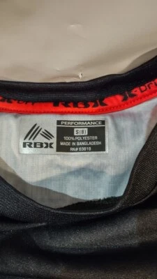 Camisa RBX Performance X-Dri cuello en V negra/plateada para mujer talla X grande usada en excelente estado original RN:63619 Foto 1 de 4