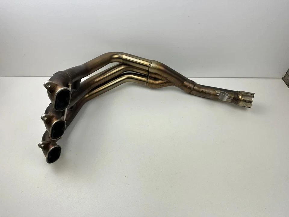 COLECTOR DE ESCAPE TRIUMPH 1050 SPEED TRIPLE 2011-2016 - Imagen 1 de 4