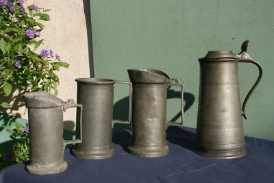 lot 4 pichets en étain ancien  voir marques lot 6. - Photo 1/4