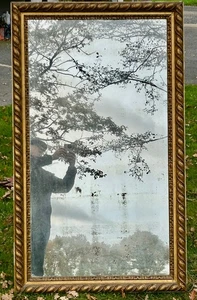 Grand miroir ancien doré Bois et stuc godrons miroir partielement dé-mercurisé - Photo 1/19