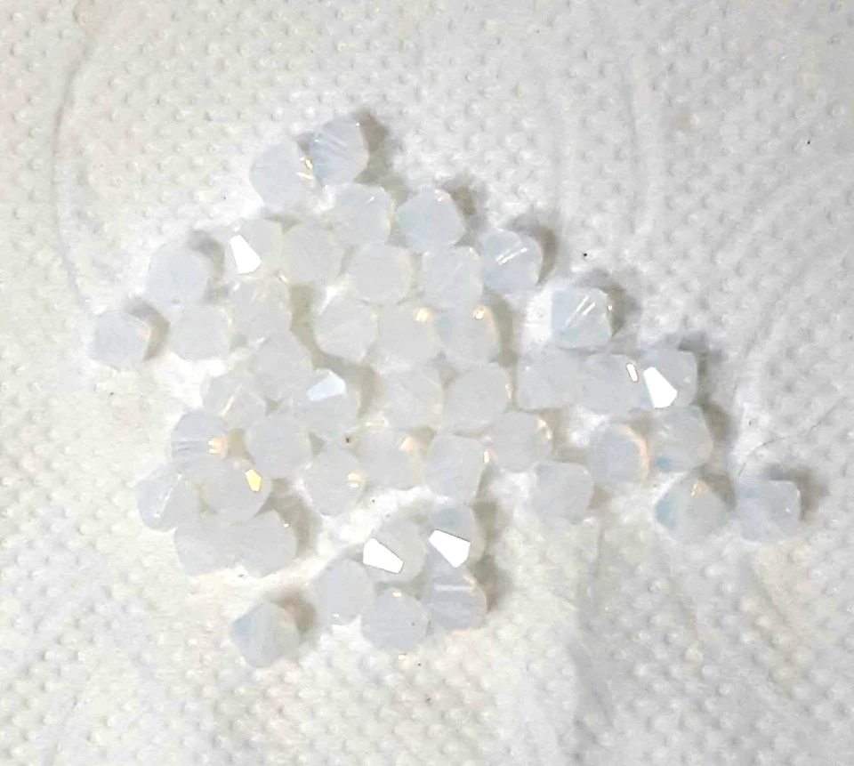 42 cuentas bicónicas de cristal de Swarovski genuinas, #5328, 6 mm, ópalo blanco Foto 1 de 1