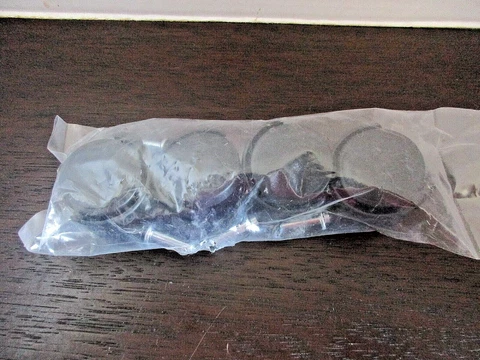 Four New Castors in Sealed Package Cover