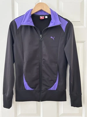 Chaqueta deportiva Puma negra y morada para mujer pequeña con cremallera con bolsillos dentro y fuera Foto 1 de 4