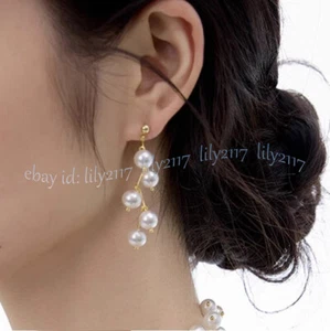 Orecchini pendenti perle bianche tonde naturali originali dei mari del sud perle 8-9 mm - Foto 1 di 6