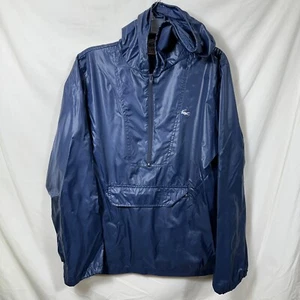 Giacca a vento vintage in alligatore Lacoste blu 1/2 zip con cappuccio tasca a marsupio con cerniera - Foto 1 di 8