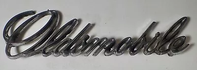 Oldsmobile Cutlass 1971 vintage parrilla emblema de escritura OEM 9858566 Foto 1 de 4