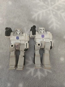 2 Vintage Hasbro Transformers 1985 Megatron Erasers - Picture 1 of 5
