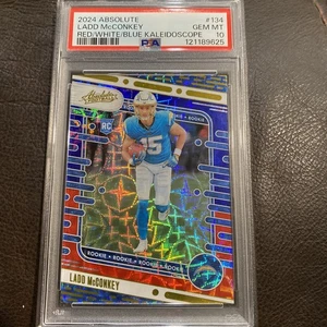 PSA 10 2024 PANINI ABSOLUTE RED/WHITE/BLUE KALEIDOSCOPE #134 LADD MCCONKEY RC - Picture 1 of 4