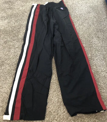 CALÇA DE AQUECIMENTO VINTAGE NFL SHIELD GEAR TEARAWAY BOTÃO DE PRESSÃO TAMANHO GG 18 JUVENTUDE A15 - Imagem 1 de 4