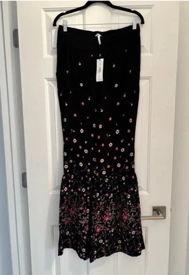 NWT BCBGeneration black bell bottom flowered pants - $108 Bloomingdale’s - Med - Image 1 of 4