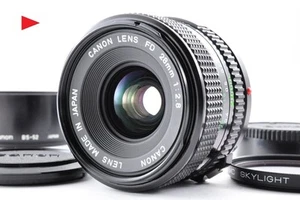Nuevo objetivo Canon FD NFD 28mm f2.8 MF con capucha de filtro [casi como nue... - Imagen 1 de 17