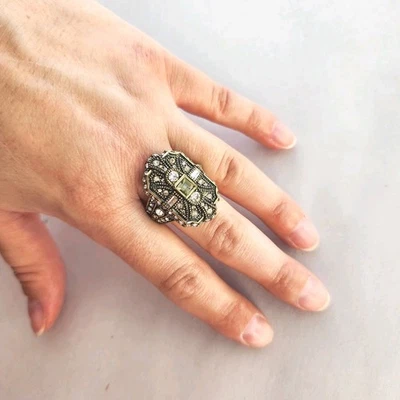 HEIDI DAUS “Deco Trilogy Shield" Champagne Tan Crystal Ring Band Bronze Size 8 - Image 1 of 4