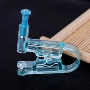 Dispositivo de perforación de uñas de oreja desechable de seguridad para piercing de oreja - Imagen 1 de 8