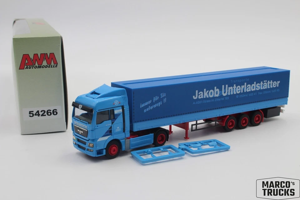 AWM MAN TGX semi-trailer truck "Jakob Unterladstätter Strass Zillertal" 54266 1: - Image 1 of 1
