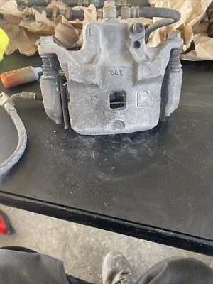 03-06 Infiniti G35 Nissan 350Z Front Left Driver Brake Caliper 41011AM801 - Image 1 of 4