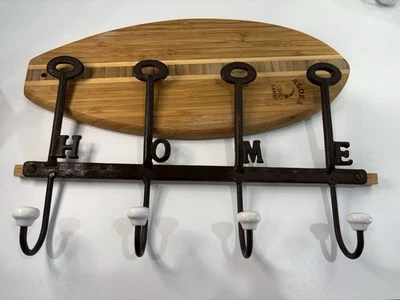 Gancho de pared de hierro fundido “HOME” bronce 4 ganchos colgador vintage abrigos toallas sombreros Foto 1 de 4