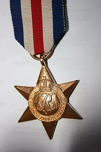 SEGUNDA GUERRA MUNDIAL FRANCIA Y ALEMANIA MEDALLA ESTRELLA DE CALIDAD REPUESTO TAMAÑO COMPLETO CON CINTA - Imagen 1 de 1