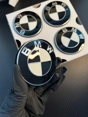56mm BLACK & WHITE BMW Floating Wheel Centres - Image 1 of 4